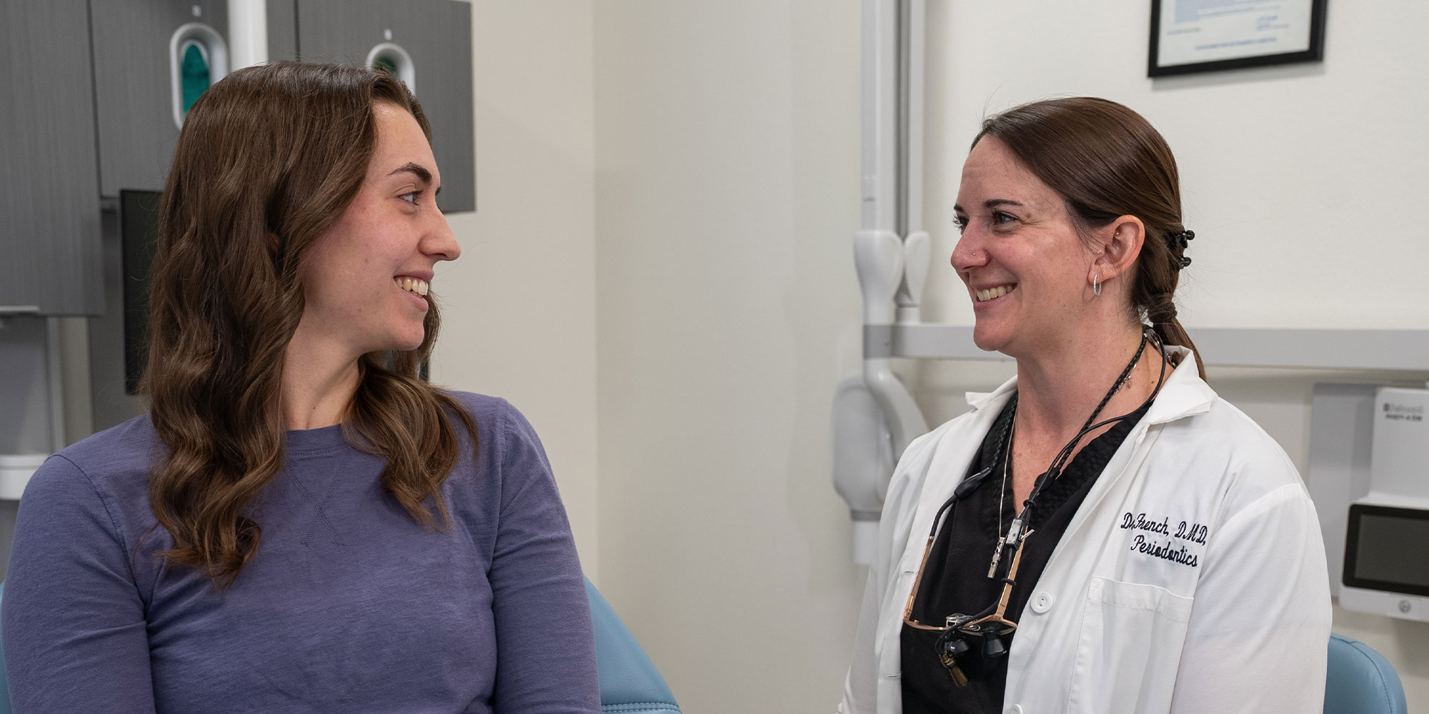 dr french with dental patient